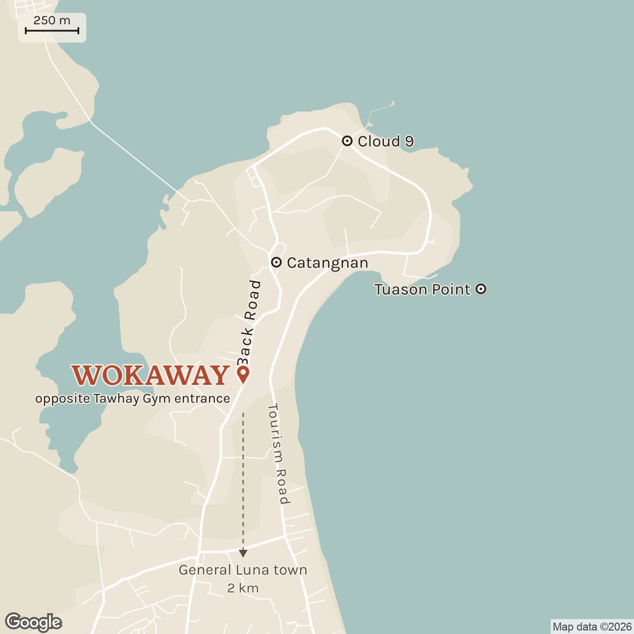 A street map of Catangnan, General Luna, with a marker on Wokaway just off Tourism Road and the coast to the east
